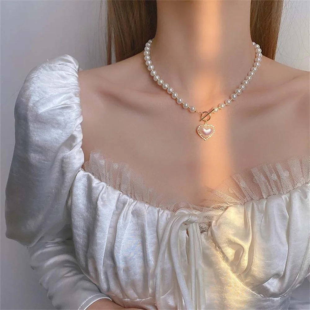 Elegance of Pearls with a Heart Pendant