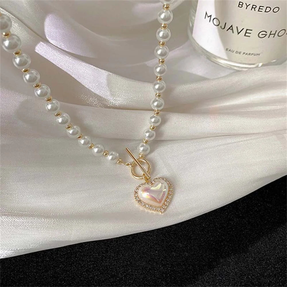 Elegance of Pearls with a Heart Pendant