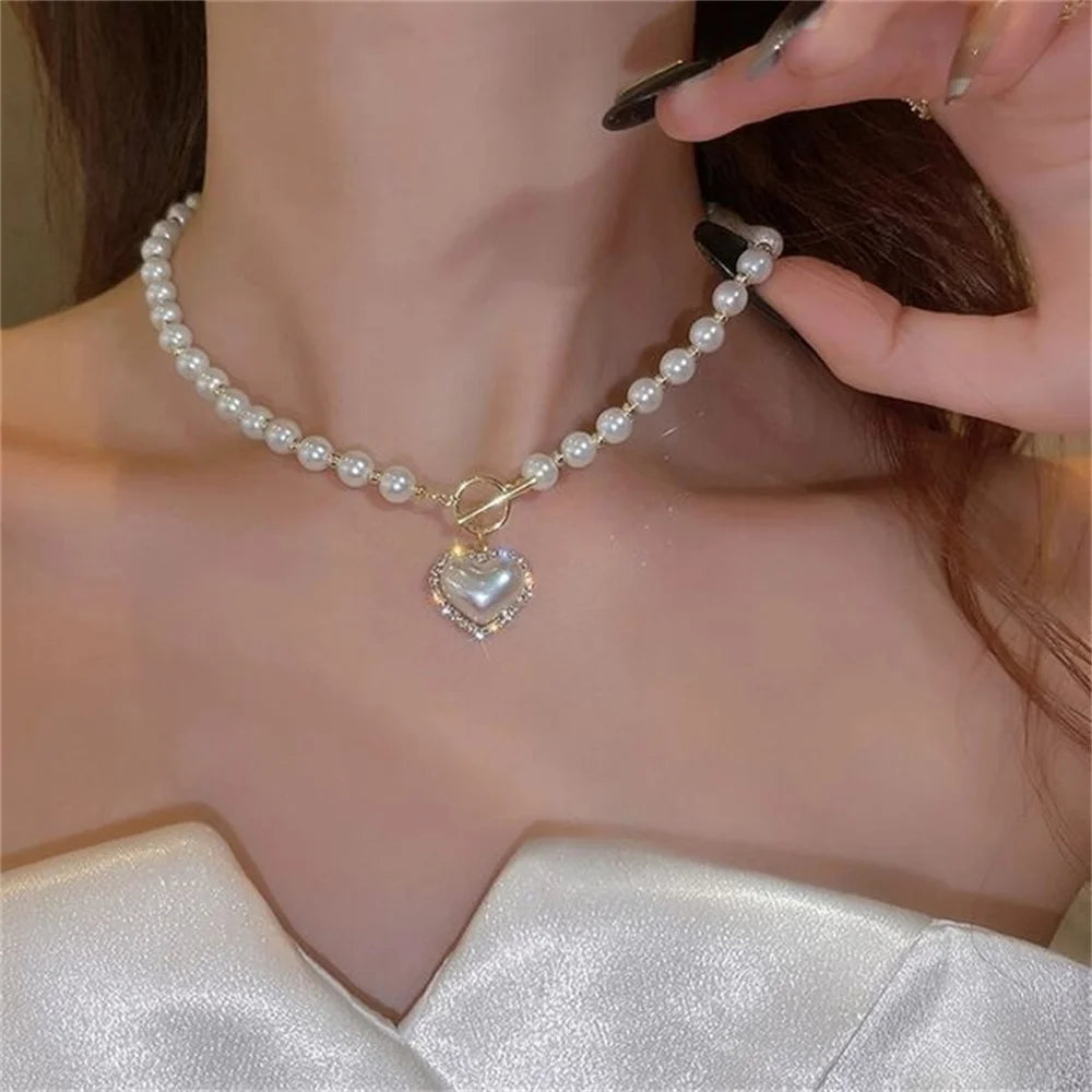 Elegance of Pearls with a Heart Pendant